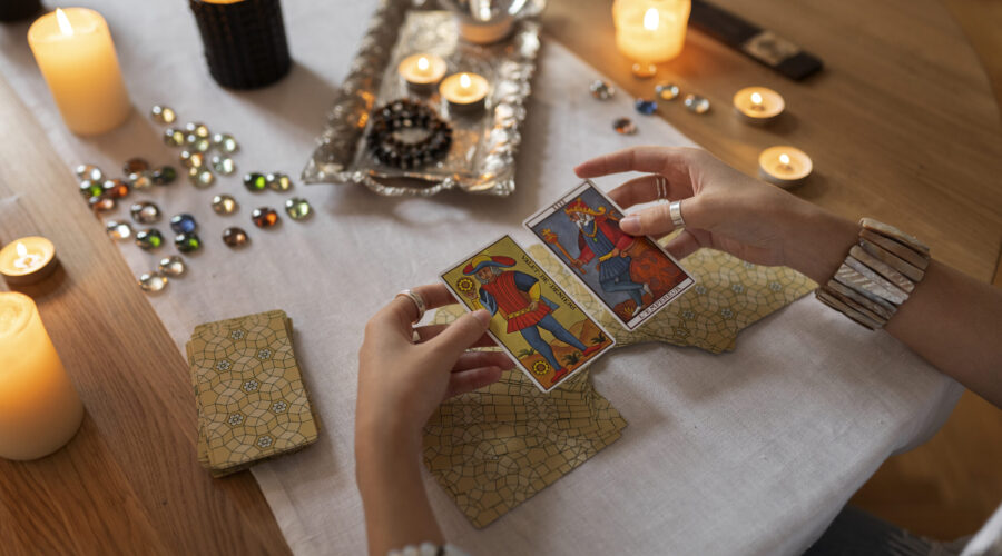 high-angle-woman-reading-tarot